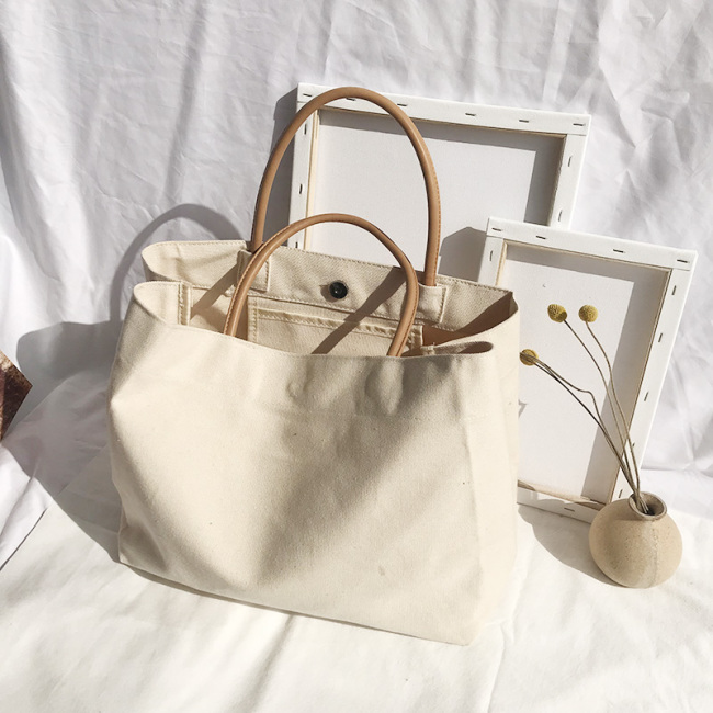 Factory direct supply customized natural color eco friendly recycled cotton canvas tote shopping bag with leather handle