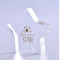 Pisapapeles cristalino en forma de estrella claro modificado para requisitos particulares al por mayor de la moda para la decoración del escritorio