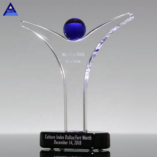 Trophée de figurines en cristal gravées sur mesure pour Team Up Honor Awards